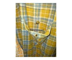 Camisa  de  cuadros  amarilla   10   € - 8/9